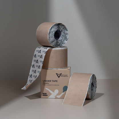McConnell Therapeutics Under Tape Sensitive displayed with unrolled section highlighting soft, breathable non-woven fabric